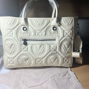 Elegant Cream Quilted Handbag